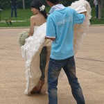 Bride's Jeans Under Her Dress (Held by Photography Assistant)