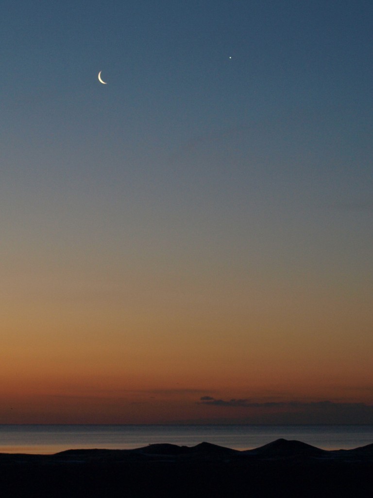 Crescent Moon and Venus at Sunrise by The Beach