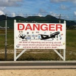 Warning Sign by Maho Beach