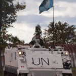 White UN Troop Carrier Underway
