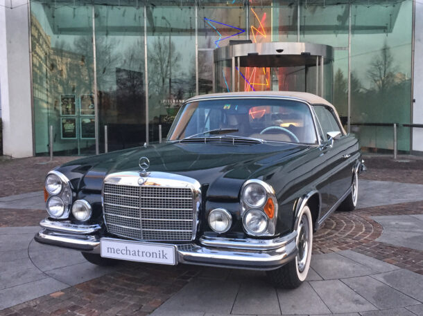 Vintage Mercedes on Display Adjacent to Hotel